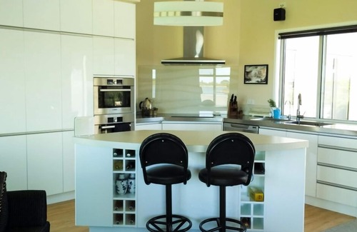 Huntingdon House | Warm and peaceful with unobstructed lake views.