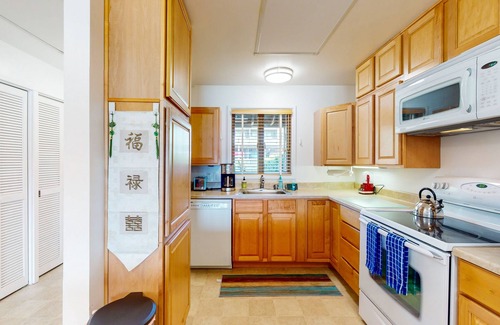 Port Ludlow Condo | Water-view condo with deck, grill, yard games, resort pools, hot tub, and gym