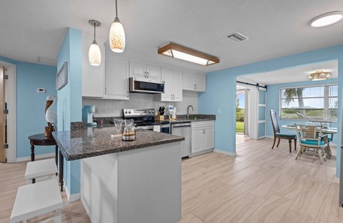 Port Richey Apartment | Waterfront! 2BR w/Firepit & Grill!