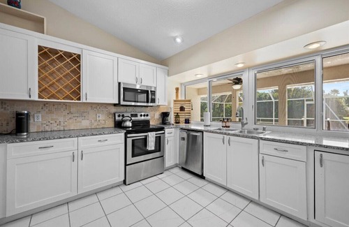 Port Saint Lucie House | Waterfront 3/2 Pool Home - PSL with Boat Lift