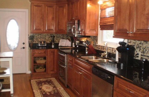 Sandbridge House | Waterfront Beach House. Pool, Cabana, Outdoor kitchen. Canoe, kayak, p/board