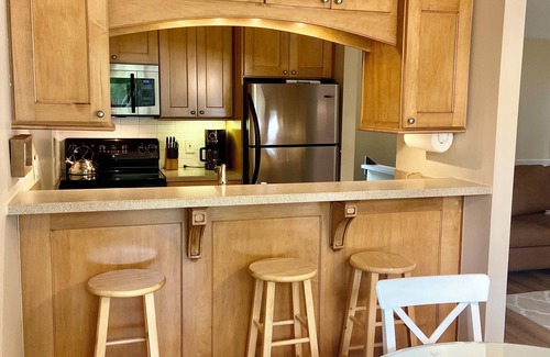 Menonaqua Beach Condo | Waterfront Condo On Little Traverse Bay. Beaches, Tennis,Near Golf And Ski