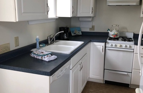 Three Mile Bay Cottage | Waterfront Cottage, Palm Tree Pointe, private space right on the water.