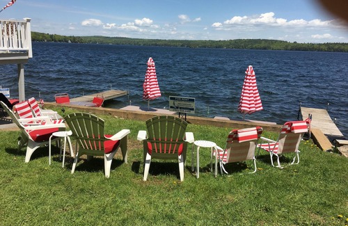 Laconia House | WATERFRONT HOME BOAT HOUSE BOAT SLIPS PANORAMIC LAKE AND GUNSTOCK MOUNTAIN VIEW