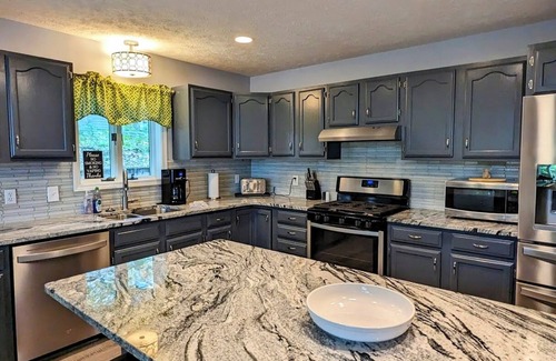 Mayfield House | Waterfront in Traverse City. Pool table. NEW! Hot tub. Pet okay.