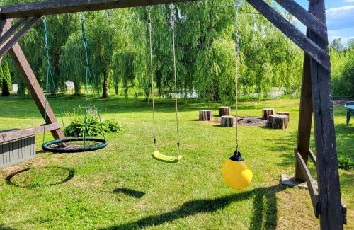 Elk House | WczasyMazurskie - Domek całoroczny Piwonia Mazury z prywatną plażą