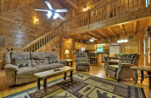 Ellijay Cabin | Welcome to Relaxing River Retreat, where your pets are welcome amidst a scenic riverfront, screened porch, hot tub, WiFi, firepit, and abundant wildlife