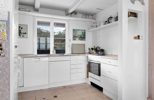 Rrvig House | Welcoming holiday home right down to the water