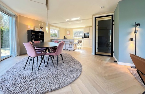 Westerhaar-Vriezenveensewijk House | Wellness house by the water with sauna, hot tub, and private beach