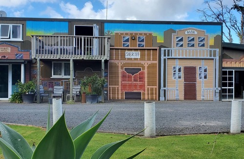 Coromandel House | Western Theme Mural,Private,Unique,Rustic,Sea Views,Sunsets,Bush,Pet friendly.