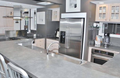 Suttons Bay House | White Fence-Exquisite Private Waterfront!
