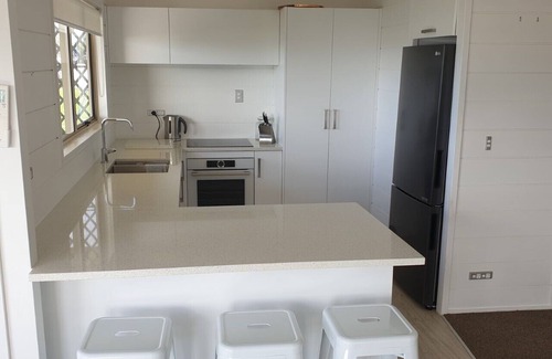 Whitianga House | Whitianga Sea Views. A beautiful house offering the ultimate in coastal views.