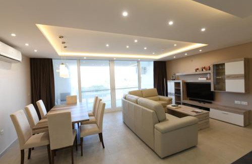 Qala Apartment | Wileg 4B Luxury Two Bedroom Apartment with Shared Swimming Pool.