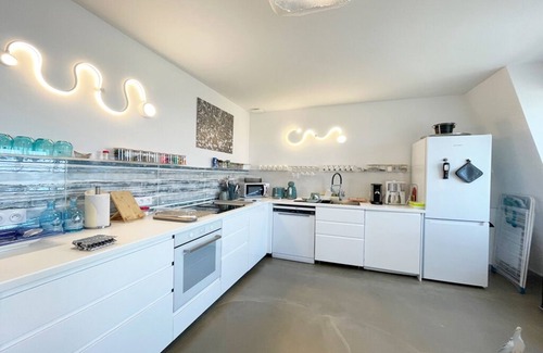 Port-en-Bessin-Huppain Apartment | WINDOWS AND BALCONY OVER THE SEA - Cap Mer is a 100m2 penthouse apartment.