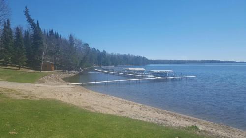 Oslund House | Wonderful Home on Sand Lake with Expansive Porch!
