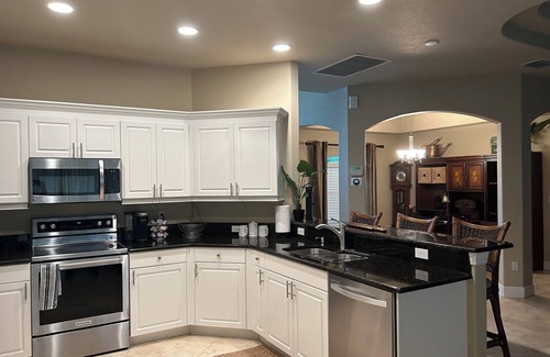 Eisenhower House | WOW! Stunning 3-Bedroom HEATED Pool Home: Your Private Oasis Awaits!