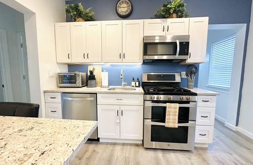 New Rochelle Apartment | Your Family Friendly Home with Large Backyard & Onsite Parking