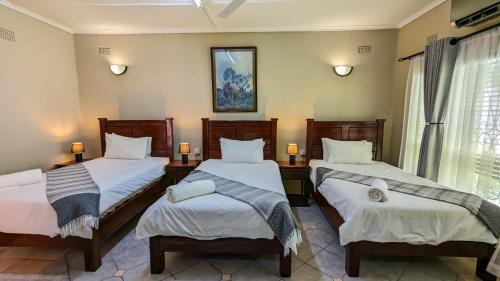Victoria Falls Cabin | Zambezi Family Lodge - Rhino Room