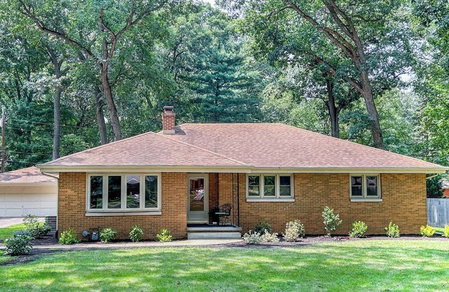 1 mile from ND! Beautifully renovated and roomy 4-bed, 3-bath home, wooded lot.