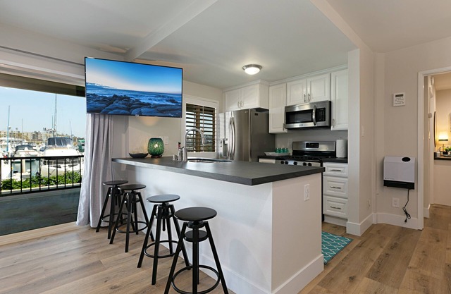 106B New Renovation! Huge Patio with Harbor View