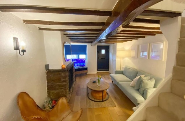 1750's cottage with open fire and beams in the historic village of Up Holland