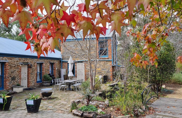 1890s stone hayloft overlooking beautiful gardens and courtyard.