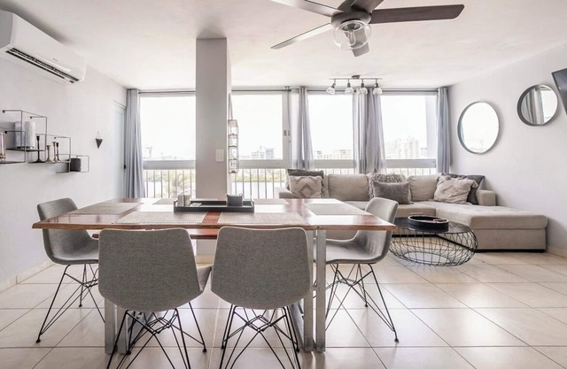 2 bd - 1 ba modern apartment with lagoon view and parking!