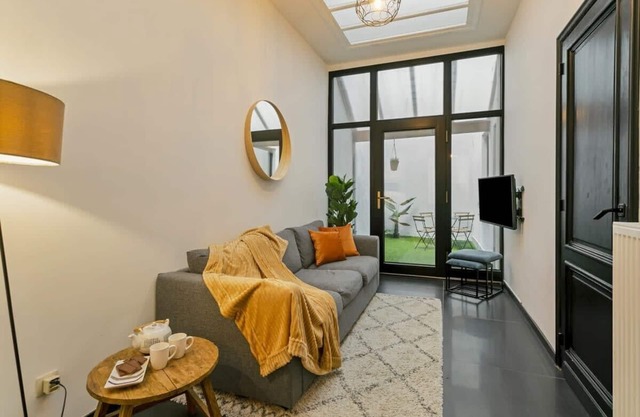 2-Bed Haven with Patio in Antwerp + Free parking