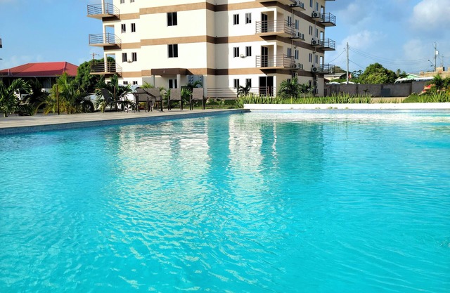 2-bedroom condo in Buccoo, Tobago with 2 Pools, AC, WiFi, Cable, 24hr Security