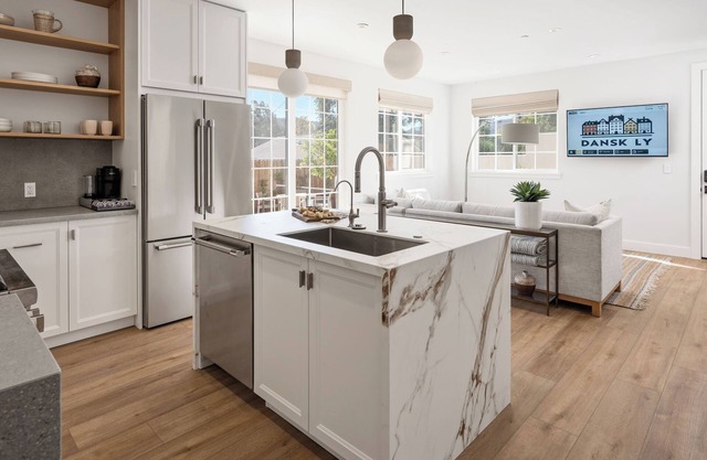 2 Bedroom Suite with Private Yard & Off-Street Parking. Full kitchen & living.