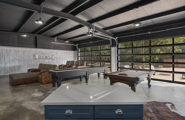 2 BLKs off main; 4 master BR; Entertainment barn w/AC; fire pit; hot tub