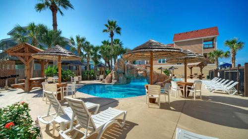 2 Blocks to the Beach Patio Resort Pool w Slide Tranquil Tides by AvantStay