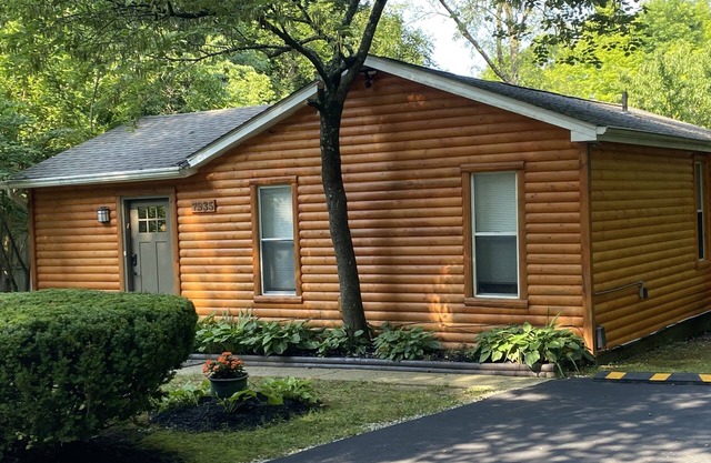 2 BR, 1-1/2 bath house in wooded setting with private back yard, deck, hot tub.