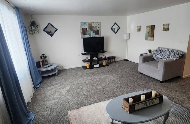 2 large Bdrm 1 bath, living room with eat in kitchen and private deck