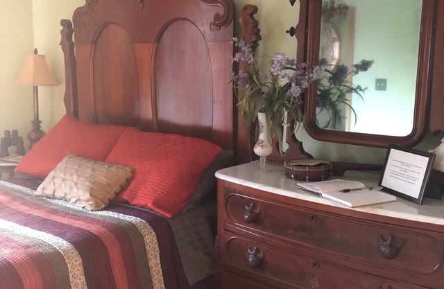 2nd-floor guestroom with attached bath