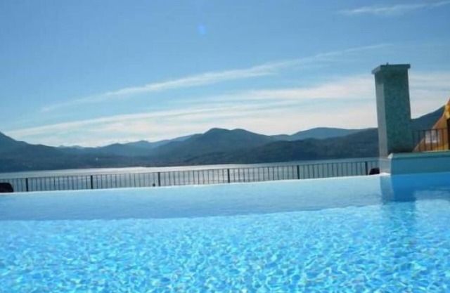 3-room apartment with panoramic pool in an architecturally charming residence