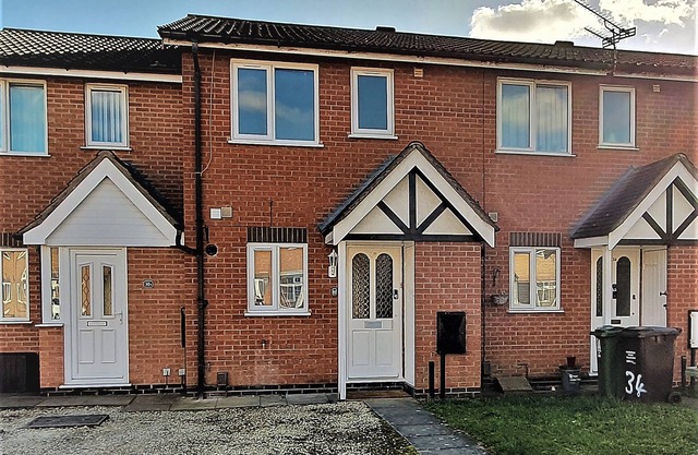 32 MOORLAND HOUSE, with a garden in Syston