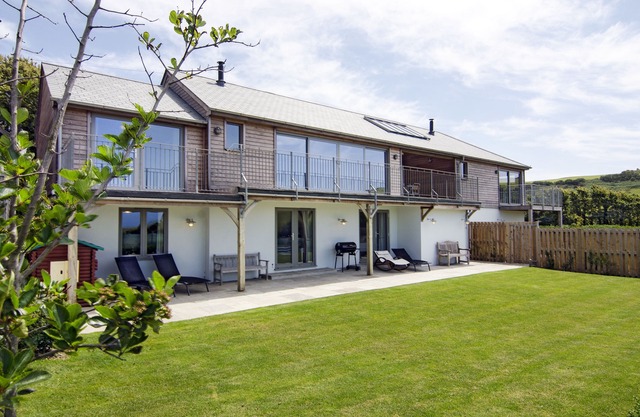 5* dog-friendly holiday home with exceptional coast and countryside views.