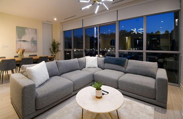 5BR townhouse with private dock, patios, and stunning views.