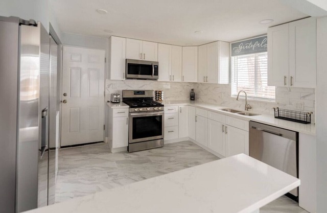 8673 W 63rd Pl · Golfers Dream! Sweet NW location.