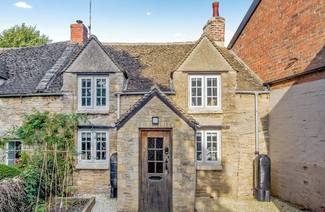 A charming and characterful Cotswold cottage in the heart of a quaint village.