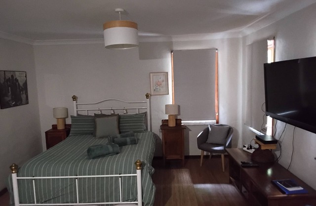 A great country escape for a couple in a bushland settingn