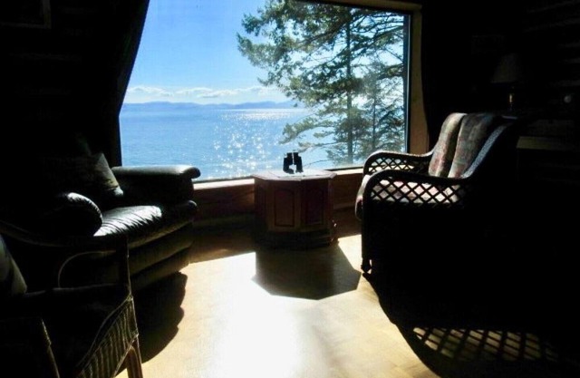A Heritage West Coast Log Home With Private Beach