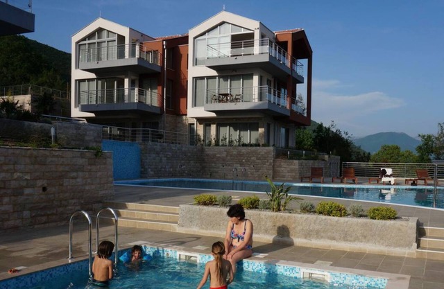 A Penthouse above the sea with a big infinity pool and a children pool
