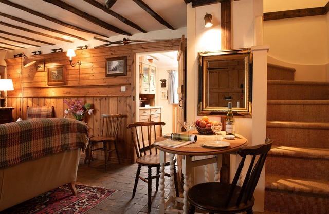 A romantic little Flax Workers Cottage with a beautiful open fire and an enclosed garden which leads