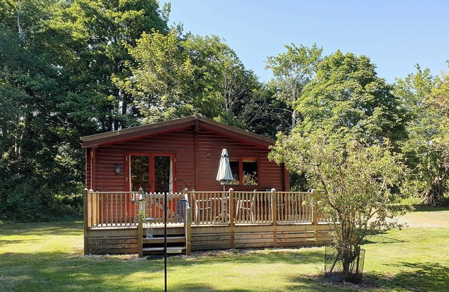 A single storey lodge set in nine acres of countryside.