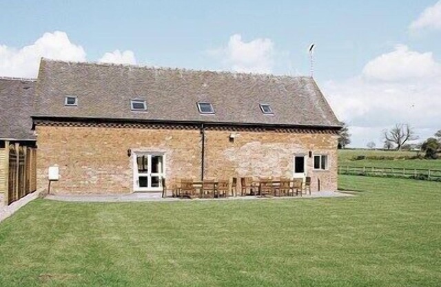 A spacious four star barn conversion set in 150 acres of farmland.