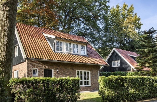A spacious vacation home located on an estate.