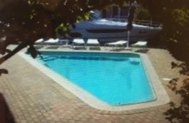 AMAZING LAGOON FRONT HOUSE WITH HEATED POOL AND HOT TUB IN HARVEY CEDARS, LBI