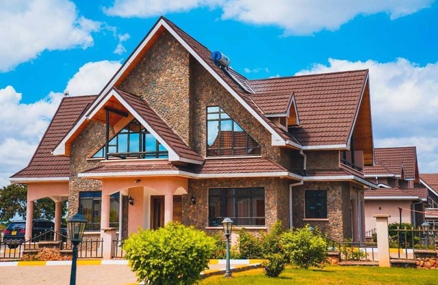 An elegant villa located in a serene Golf Resort, where luxury meets opulence.